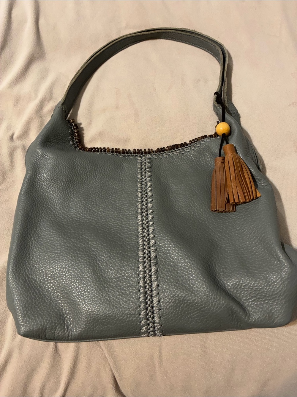 The Sak Sage Green Leather Shoulder Bag with Brown Tassel